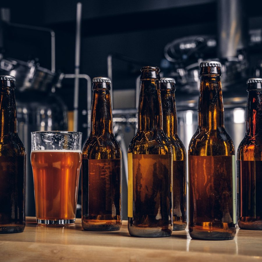 bottles-and-glass-of-craft-beer-on-wooden-bar-counter-at-the-indie-brewery-.jpg bottles-and-glass-of-craft-beer-on-wooden-bar-counter-at-the-indie-brewery-.jpg